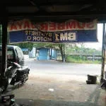 Sumber Jaya Motor Auto company logo